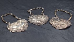 A group of three George IV silver spirit labels, embossed with Sanglier head within an arsenal of