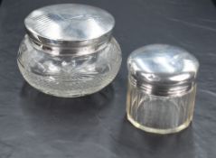 A George V silver-topped powder jar, the slightly domed circular cover with engine-turned