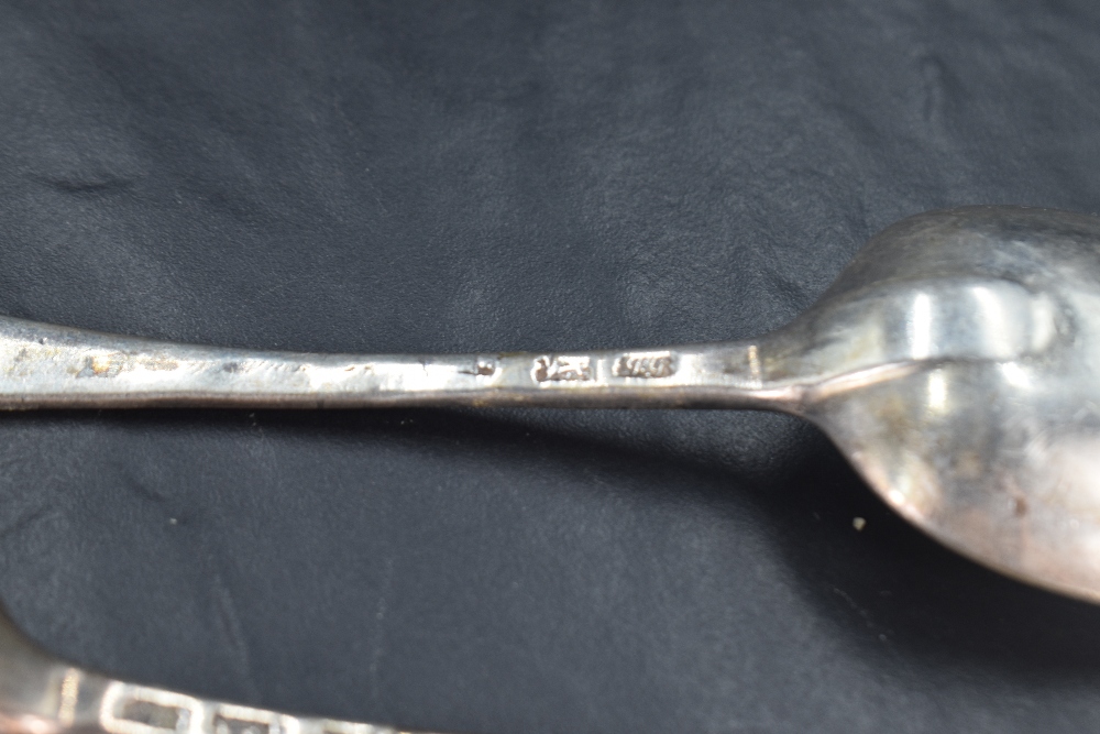 Three George II silver Old English pattern table spoons, the terminals engraved with crest 'A Dexter - Image 5 of 5