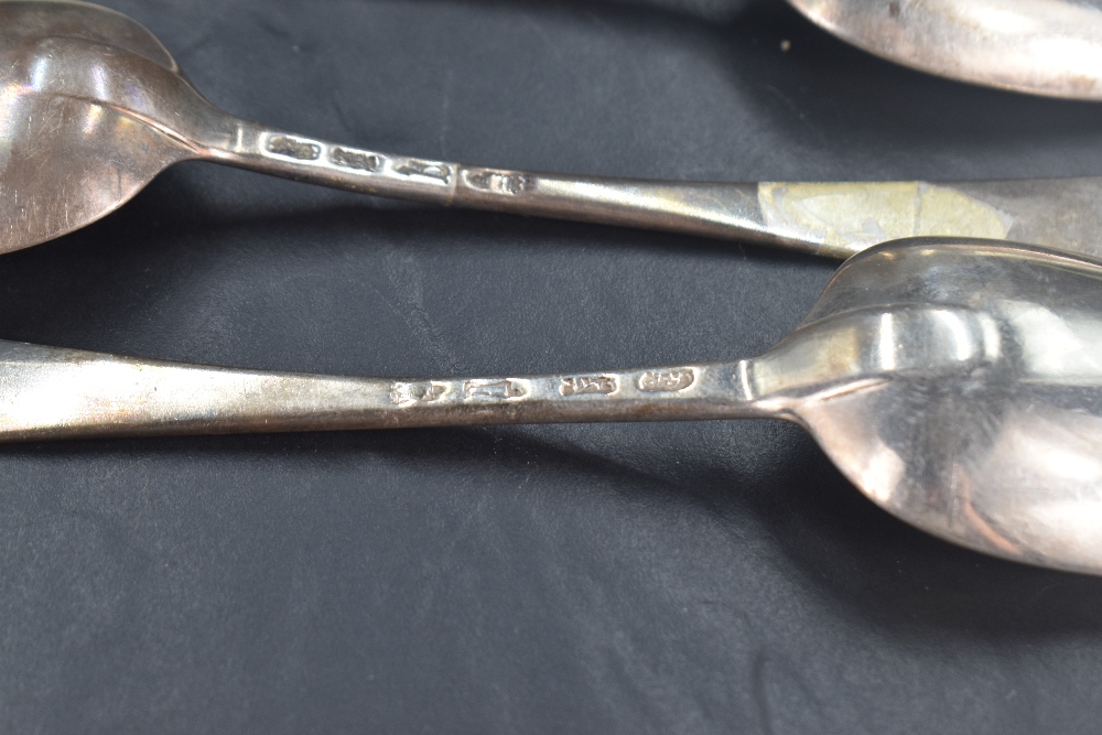 Three George II silver Old English pattern table spoons, the terminals engraved with crest 'A Dexter - Image 3 of 5