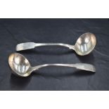 A pair of George III silver fiddle pattern sauce ladles, engraved with initial C to terminals, third