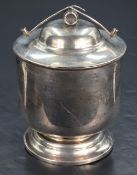 An Edwardian silver tobacco jar, having a domed circular cover with churchwarden pipe and barrel