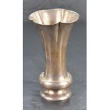 An Edwardian silver vase, of lobed and flared cylindrical form with short basel knop and spreading