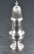 A Queen Elizabeth II silver sugar caster, of traditional baluster form with domed and pierced finial