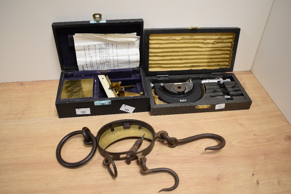 A 19th/20th Century fur trade hide scale, a Moore & Wright micrometer, and a set of balance scales