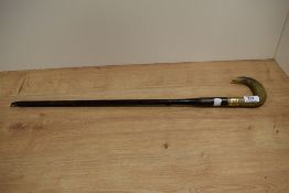 A 19th/20th Century horn handled walking stick, with damage, and having a personalised brass