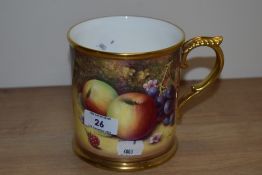 A 20th Century Royal Worcester hand painted Fruit Study tankard, signed P.Platt, and heightened with