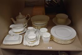A quantity of Royal Albert Val d'Or design tableware, including teapot, butter dish and cover, sauce