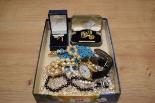 An assorted collection of jewellery and watches, to include simulated pearl necklaces,