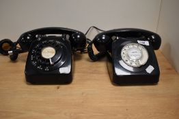 Two vintage rotary dial telephones, having been converted to modern wiring.