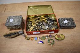 Two white metal and continental trinket boxes, and a tin of miscellaneous costume jewellery,