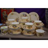 A 19th Century Royal Worcester tea set, on blush ivory ground with floral design, the base stamped