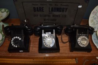 Three vintage mid century rotary dial telephones, having been converted.