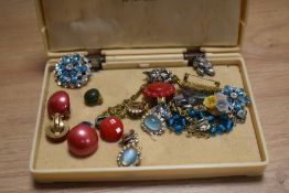 A jewellery box containing assorted clip on earrings and other jewellery, to include an Art Deco