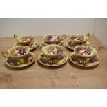 Six Aynsley Orchard Gold patterned teacups and saucers