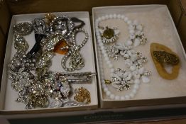 A small selection of diamante jewellery, bakelite buckle and white ceramic floral style necklace
