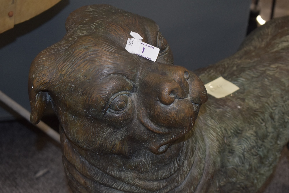 A cast bronze sculpture in the form of a 19th Century pug, patinated in appearance, and measuring - Image 3 of 8
