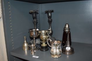 A pair of Victorian pewter candlesticks, 26cm tall, a cranberry glass sugar sifter, plus assorted