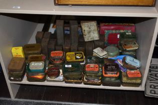A quantity of vintage advertising tins including Grand Cut tobacco tins and cough sweet tins
