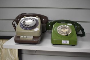 Two vintage mid century rotary dial telephones, having been converted.