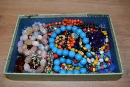 A box of assorted costume jewellery, to include modern plastic and multicoloured jewellery,