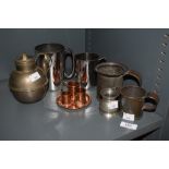 An assorted collection of metalware, to include pewter measures and tankards, and copperware