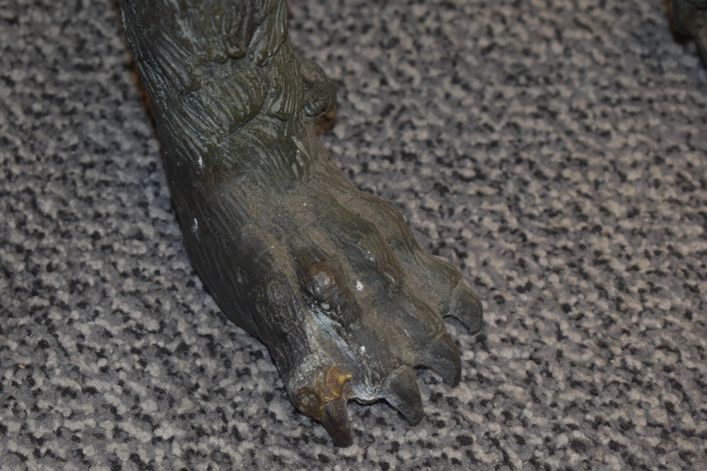 A cast bronze sculpture in the form of a 19th Century pug, patinated in appearance, and measuring - Image 6 of 8