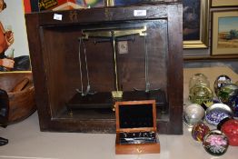 A set of Griffin & Tatlock Microid laboratory scales in a stained wood case & another set of scales