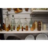 A vintage Taylor & Co. etched glass soda siphon, an assorted collection of codd and other glass