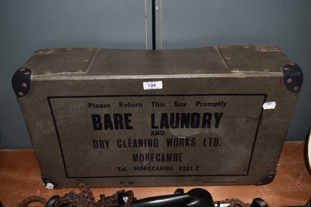 A vintage cardboard laundry or dry cleaning box, marked for Bare Laundry in Morecambe