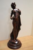 A 20th Century bronze effect figural sculpture, in the Art Nouveau style, measuring 47cm tall