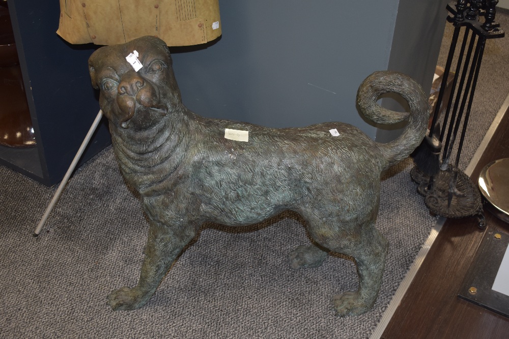 A cast bronze sculpture in the form of a 19th Century pug, patinated in appearance, and measuring - Image 2 of 8