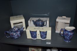 A collection of boxed Ringtons tea replica Maling ware, including boxed beakers, teapot and jug