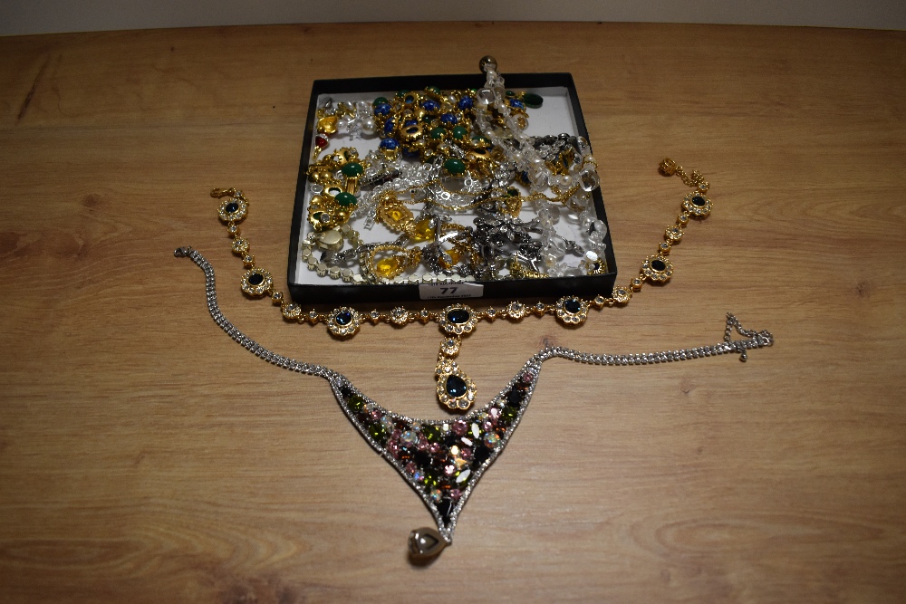 An assorted collection of costume jewellery, to include a multi-coloured designer style necklace,