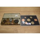 A 1970s Elizabeth II proof coin set & a tin of assorted coins and tokens