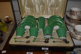 An early 20th Century cased set of Art Deco coffee cans and spoons