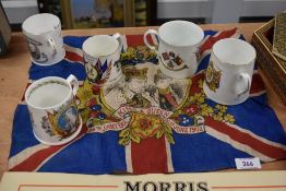 An early 20th Century King & Queen of England flag, together with five commemorative mugs