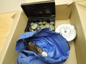 A collection of GB and World Coins, no Silver seen along with a Yorkshire Penny Bank, Coin tin etc