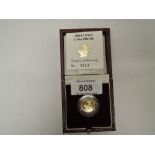 A Royal Mint United Kingdom 1990 Queen Elizabeth II Britannia 1/10oz Gold Proof £10 Coin, in case