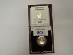 A Royal Mint United Kingdom 1990 Queen Elizabeth II Britannia 1/10oz Gold Proof £10 Coin, in case