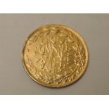 An Islamic Gold Coin, approx weight 7.2g