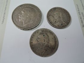 A 1935 George V Silver Crown and two Queen Victoria Silver Half Crowns 1887 & 1890, both Jubilee