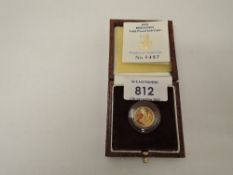 A Royal Mint United Kingdom 1995 Queen Elizabeth II Britannia 1/10oz Gold Proof £10 Coin, in case