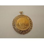 A 1978 South Africa 1oz Fine Gold Krugerrand in 9ct Gold pendant mount, total weight 43.6g