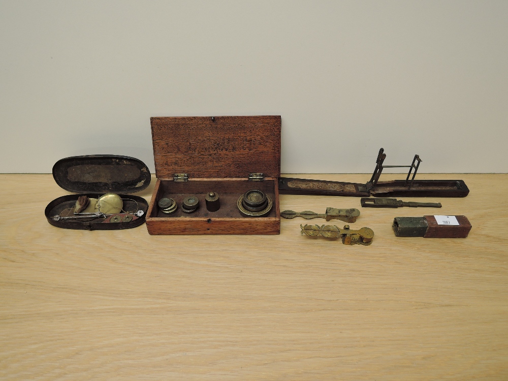 Two Victorian Sovereign Scales another Coin Scale and a part set of brass weights etc