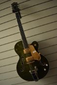 A Gretsch 6120T Brian Seltzer Signature, in green finish, serial number JT03075187, in excellent
