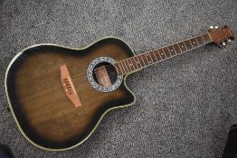 A Craftman electro acoustic guitar, model YR25TKB , with passive pickup system, serial number
