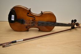 A 19th Century violin having two piece 13inch back , unlabelled with bow and later foam case