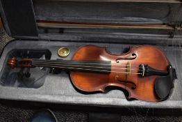 A modern violin, labelled Gliga Vasille (2010), cased with two bows