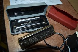 Two harmonicas, Hohner Special 20 (C Progressive) and Bandmaster Blues (C)
